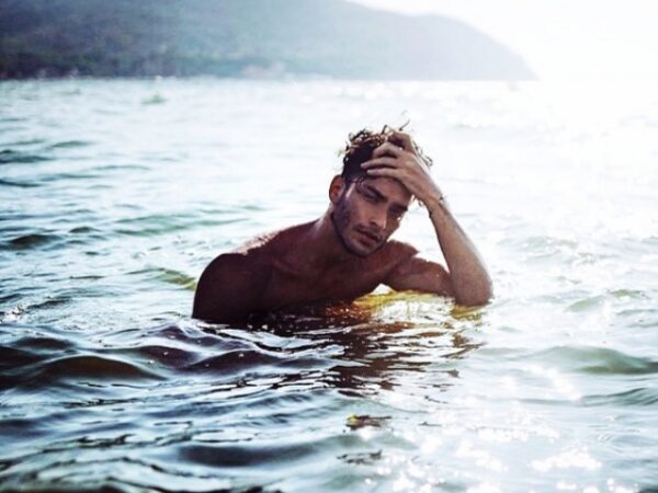 40 Symbolic Beach Photography Poses For Men